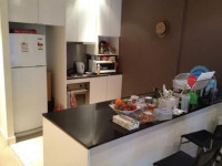 One person (own room) in 2 bed 2 bath apt on Collins St